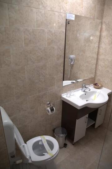 Фото номера Двухместный номер с 2 отдельными кроватями и балконом Курортные отели Complex Turistic Magura г. Мэгура 8